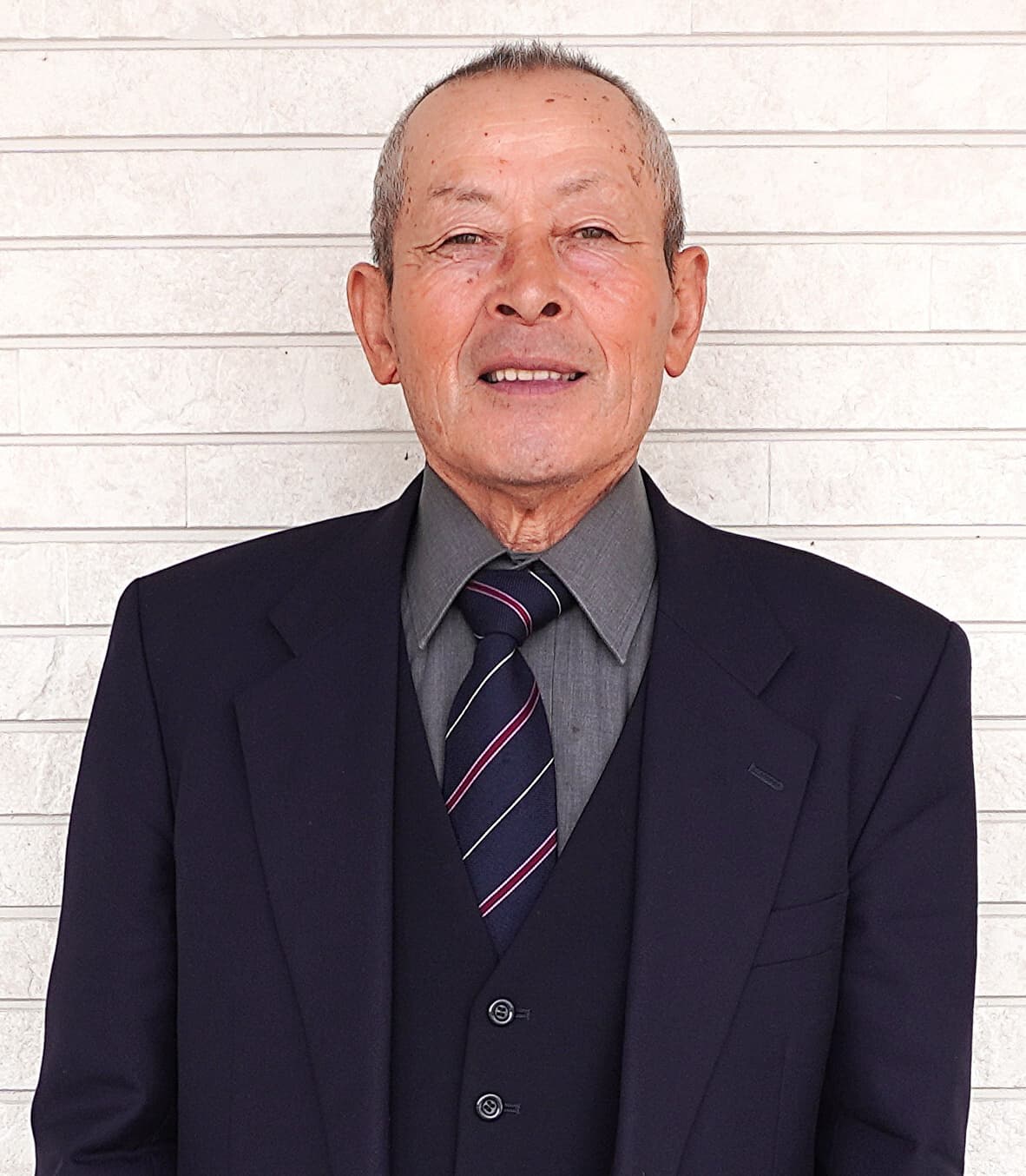 建交労、委員長、東健次